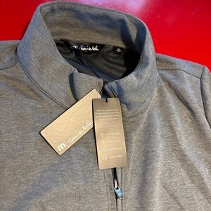 Brand new Travis Mathew full zip jacket